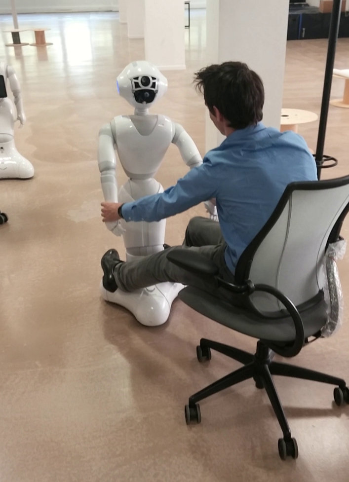 Pepper dragging a colleague